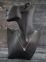 38603: Tiffany & Co. by Paloma Picasso 18k White Gold Diamond Heart Pendant