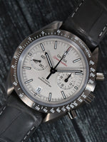 39167: Omega Speedmaster "Grey Side of the Moon", Ref. 311.93.44.51.99.002, Box and Card