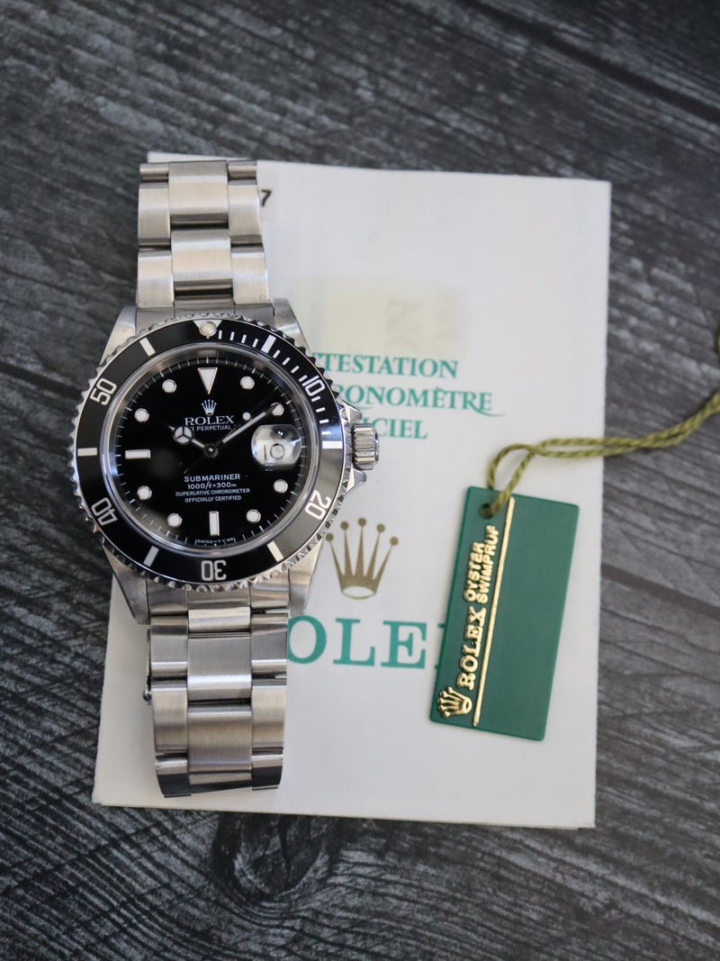 (RESERVED) 39715: Rolex Submariner 40, Ref. 16610, Papers circa 1993