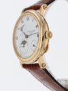 39831: Patek Philippe 18k Yellow Gold Moonphase Power Reserve, Ref. 5054J, Patek Archives 1999