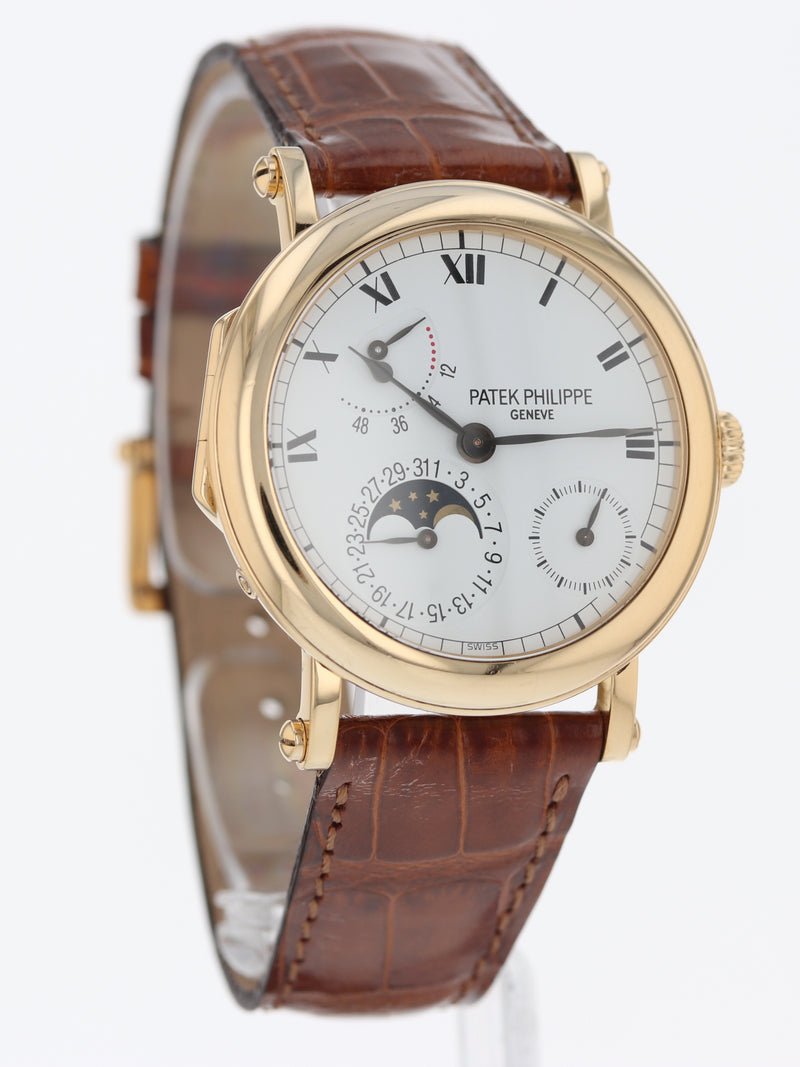 39831: Patek Philippe 18k Yellow Gold Moonphase Power Reserve, Ref. 5054J, Patek Archives 1999