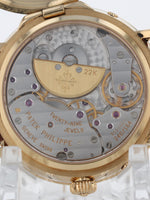 39831: Patek Philippe 18k Yellow Gold Moonphase Power Reserve, Ref. 5054J, Patek Archives 1999