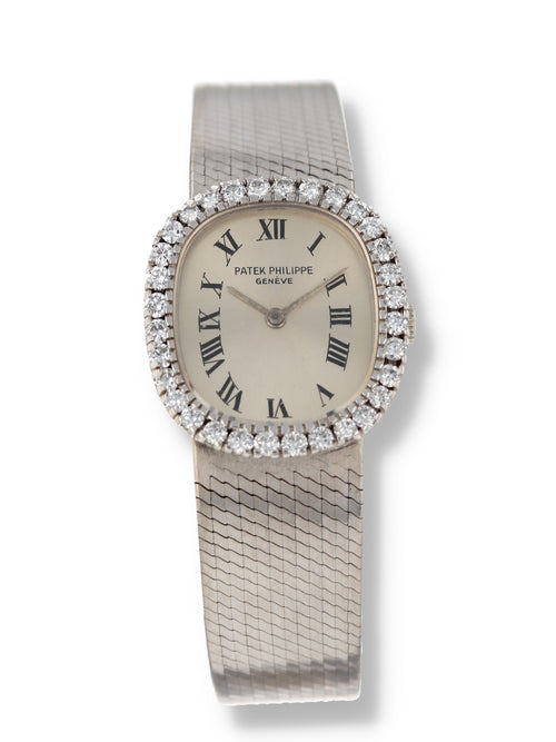 39844: Patek Philippe 18k White Gold Ladies Dress Watch, Diamond Bezel, Ref. 4134/4