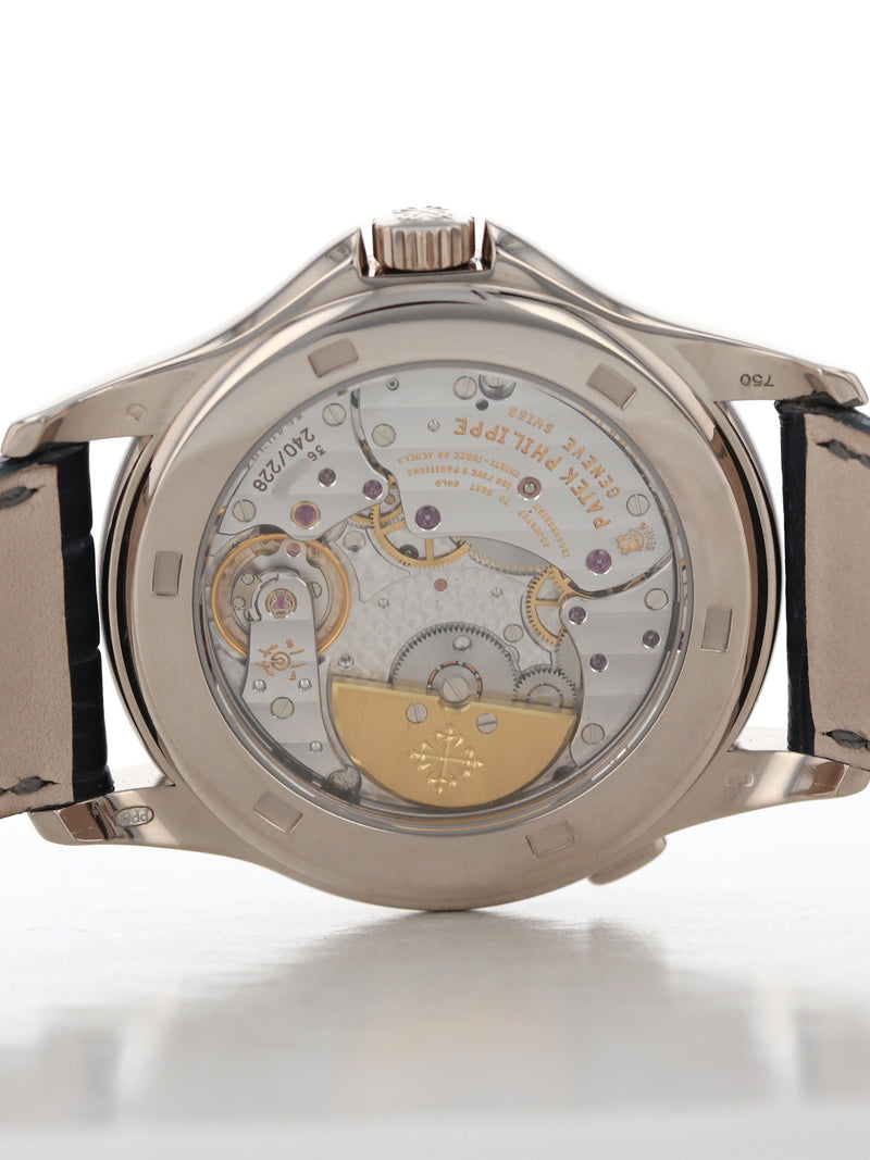 40060: Patek Philippe 18k White Gold World Time, Automatic, Ref. 5130G, Archive Papers 2007