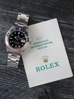 40293: Rolex GMT-Master II "Coke", Ref. 16710. Rolex papers 1995