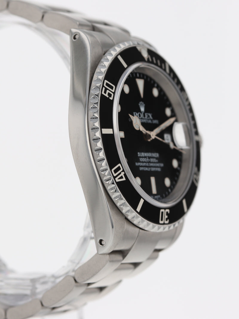 40311 : Rolex Submariner 40, Ref. 16610, Box and Papers Circa 2002