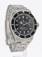 40311 : Rolex Submariner 40, Ref. 16610, Box and Papers Circa 2002