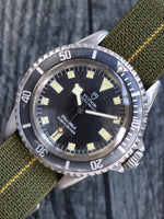 M39486: Tudor Vintage Marine National Submariner, Ref. 7016, Circa 1974 with History Papers