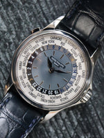 M39570: Patek Philippe Platinum World Time, automatic, Ref. 5110P, Box and Archives